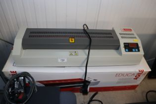 An Intimus PL-450 laminator with box