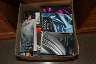 A box of miscellaneous books