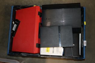 A PS2 and a PS3, both lacking leads, a collection