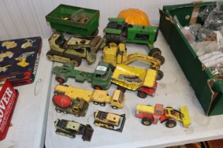 A collection of vintage Tonka Toys and a Tonka har