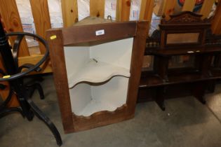 A pine corner cabinet