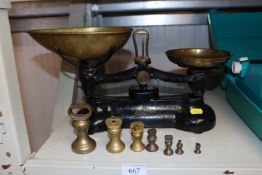 A set of Libra cast iron and brass scales with wei
