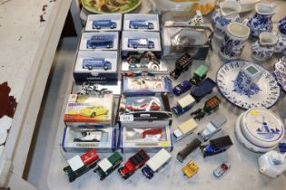 A collection of various boxed and unboxed model ve