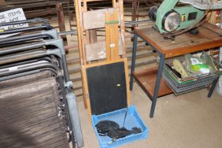 A weather vane and a child's chalk board