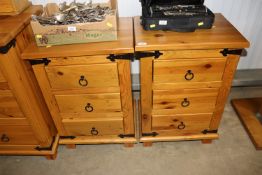 Two modern pine bedside chests fitted three drawer
