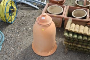 A terracotta rhubarb forcer