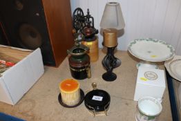 Two coffee grinders, two candle stands etc.