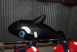 An inflatable toy killer whale