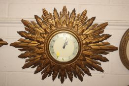 A gilt Smiths Sunburst wall clock