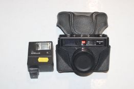 A Prinz Mastermatic camera and flash