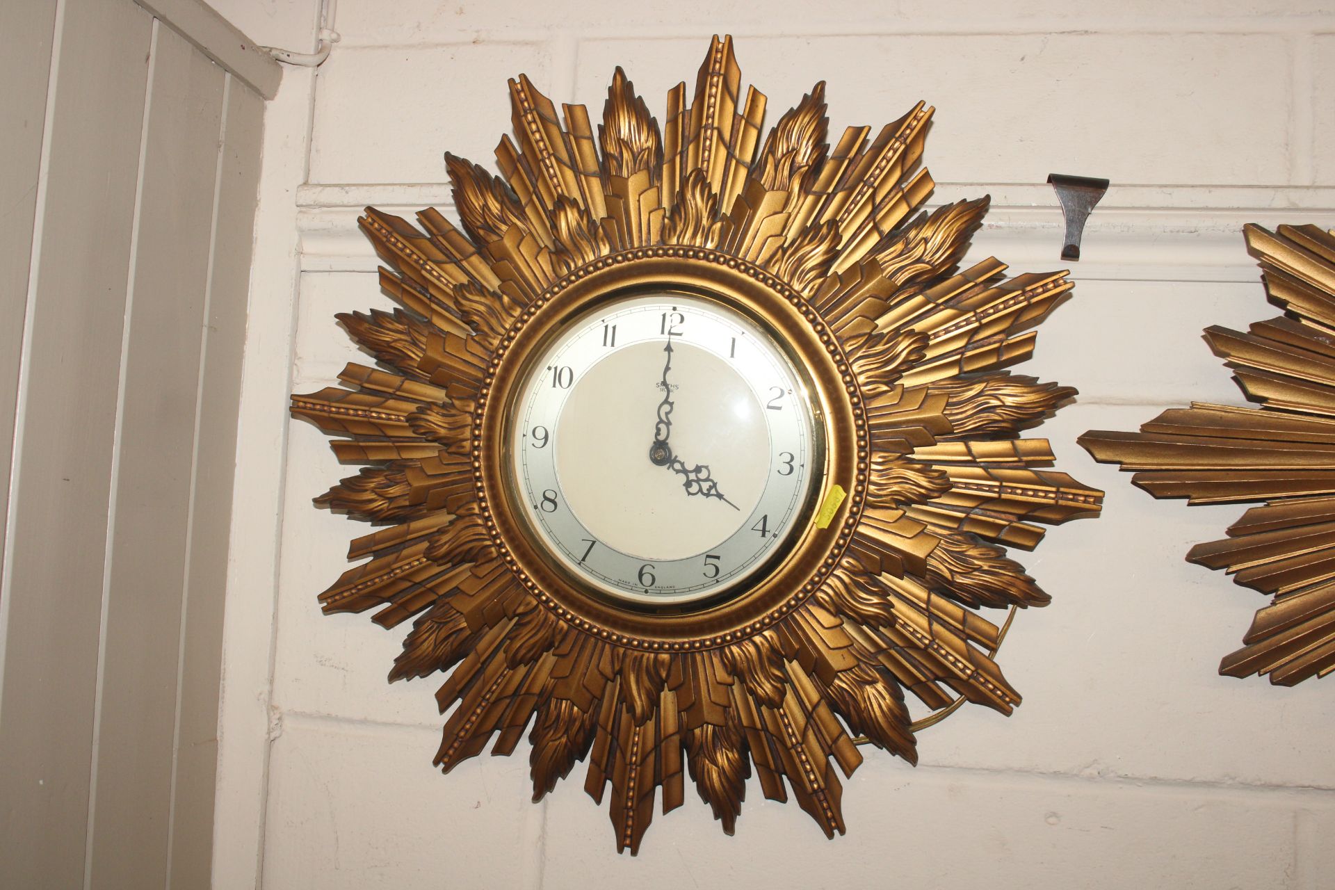 A Smiths gilt sunburst wall clock
