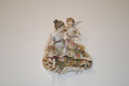 A small 19th Century German porcelain figure group