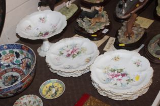 A Limoges type floral decorated part dessert set i