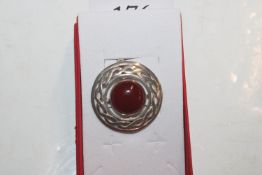 A Sterling silver and carnelian brooch, approx. 7.
