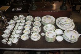 A Royal Doulton "Glamis Thistle" decorated tea / dinner service comprising dinner plates, side