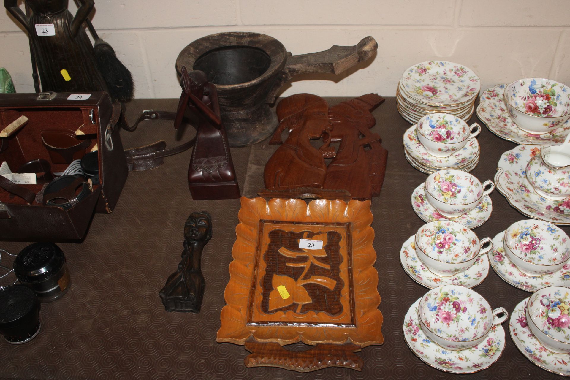 A large carved Ethnic wooden ladle and various oth