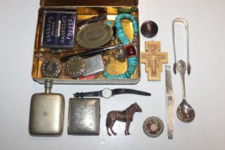 A tin containing hip flask, cigarette case, sugar