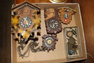 Various cuckoo clocks and keys