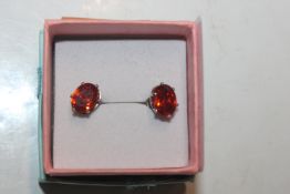A pair of Sterling silver and fire opal stud ear-r