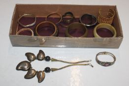 A box containing necklace, ear-rings and various b