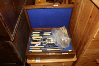 An oak cased canteen of plated cutlery and various