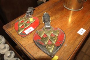 A pair of antique horse brasses