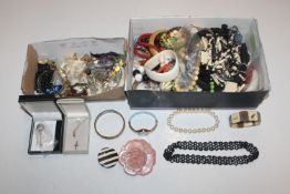 Two boxes of various costume jewellery to include