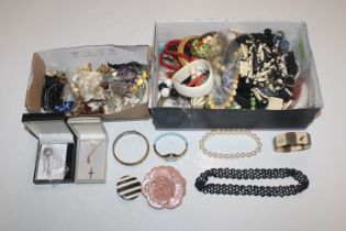 Two boxes of various costume jewellery to include
