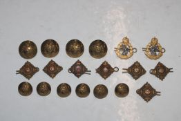 A collection of badges, Kind crown buttons, collar