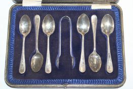 A cased set of six silver tea spoons and matching