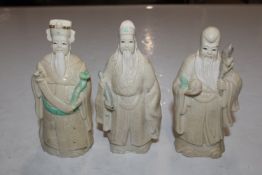 Three resin figures