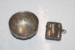 A silver vesta case and a small silver bowl, appro