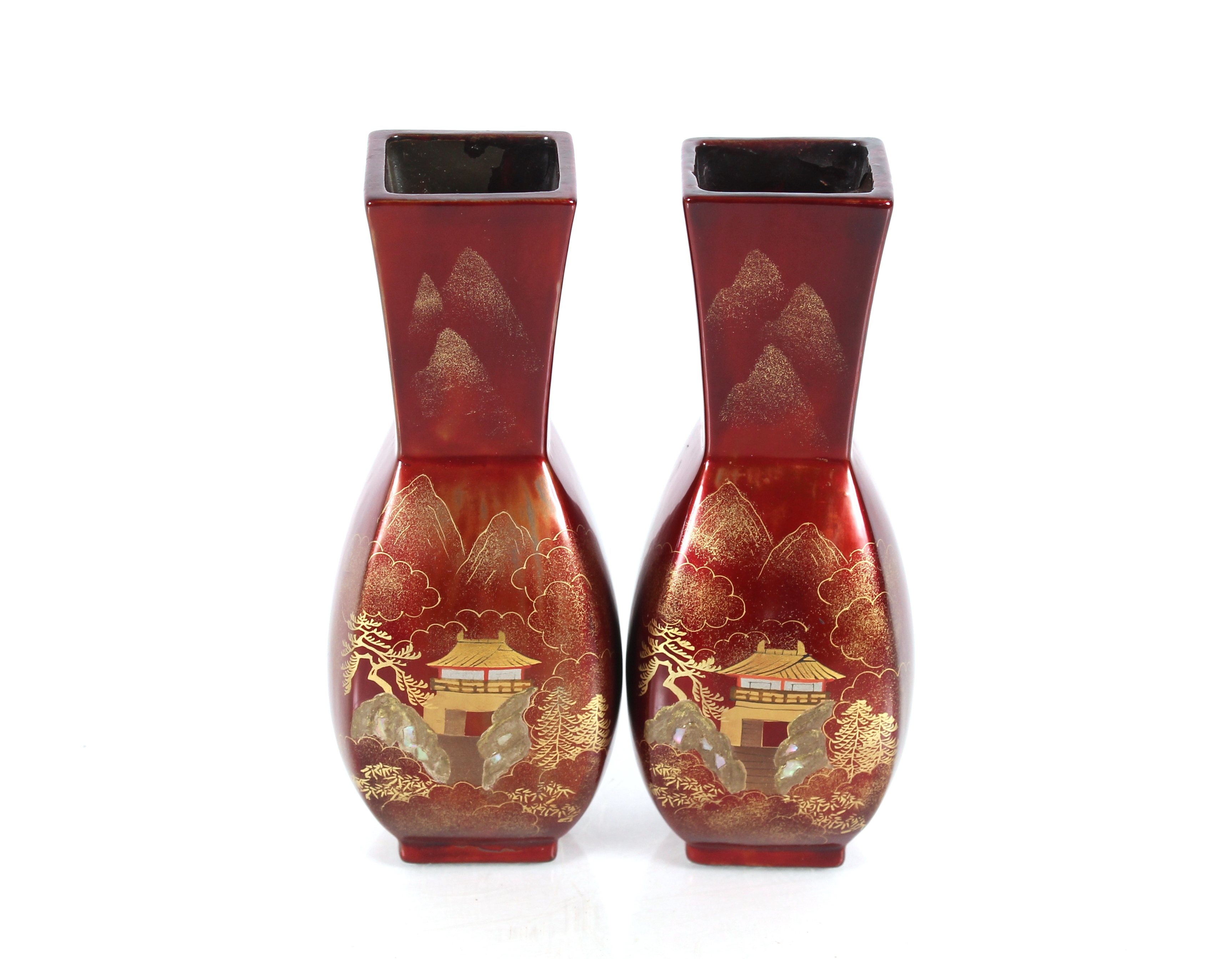 A pair of red lacquered Japanese baluster vases, 1