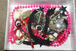 A box of costume jewellery to include bead necklac