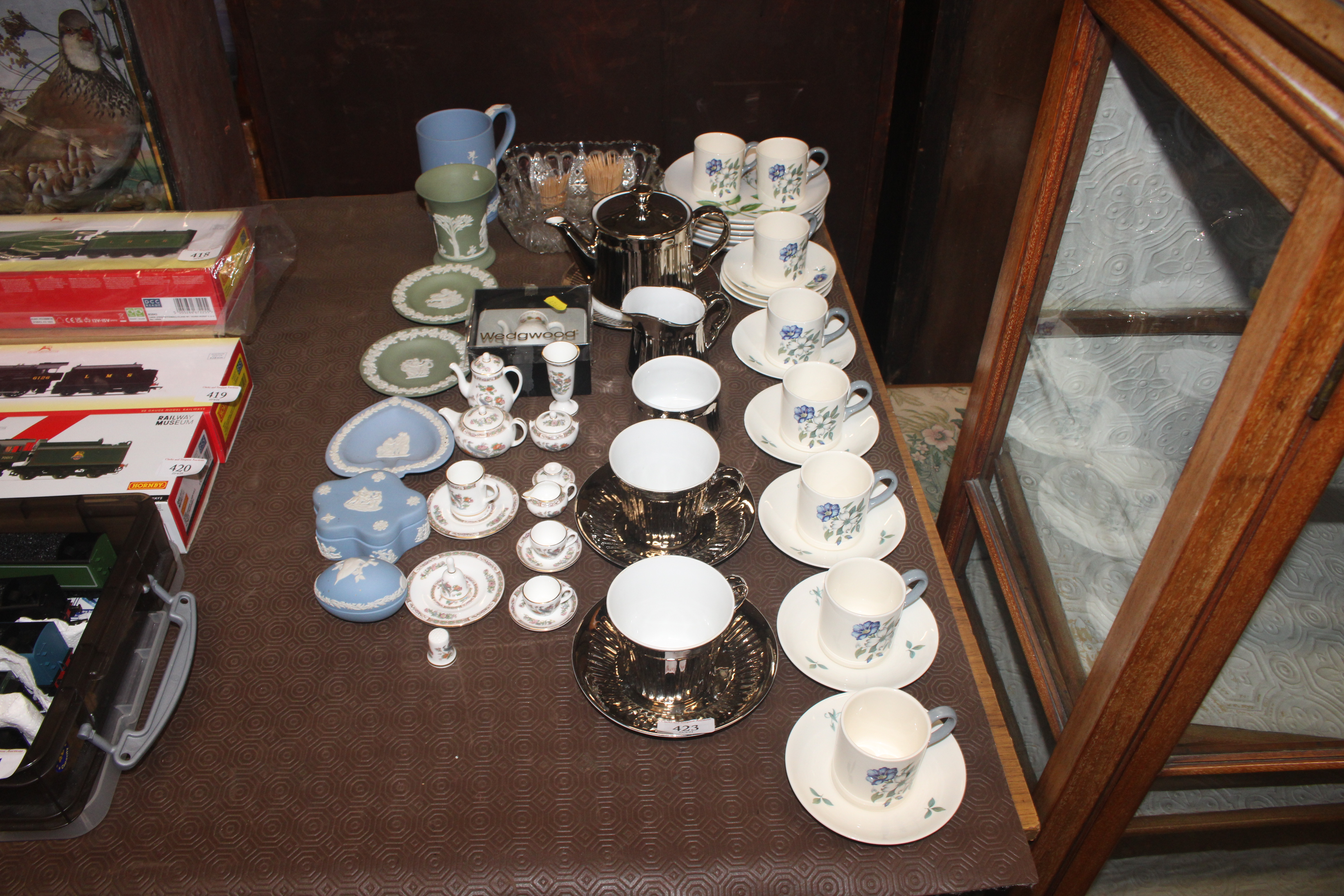 Six Wedgwood "Isis" pattern coffee cans and saucer