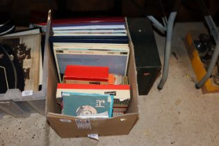 A quantity of various vinyl LP's, singles etc.