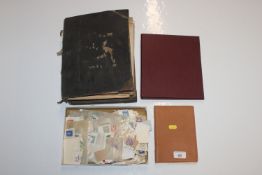 Three albums and a box containing various stamps