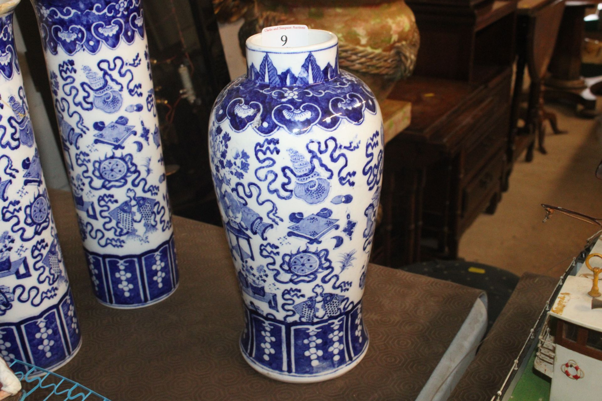 A Chinese blue and white garniture of vases compri - Image 2 of 13