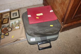 A vintage portable typewriter and a quantity of ca