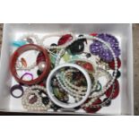 A box of costume jewellery to include necklaces, d
