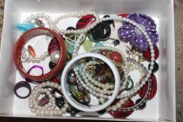 A box of costume jewellery to include necklaces, d
