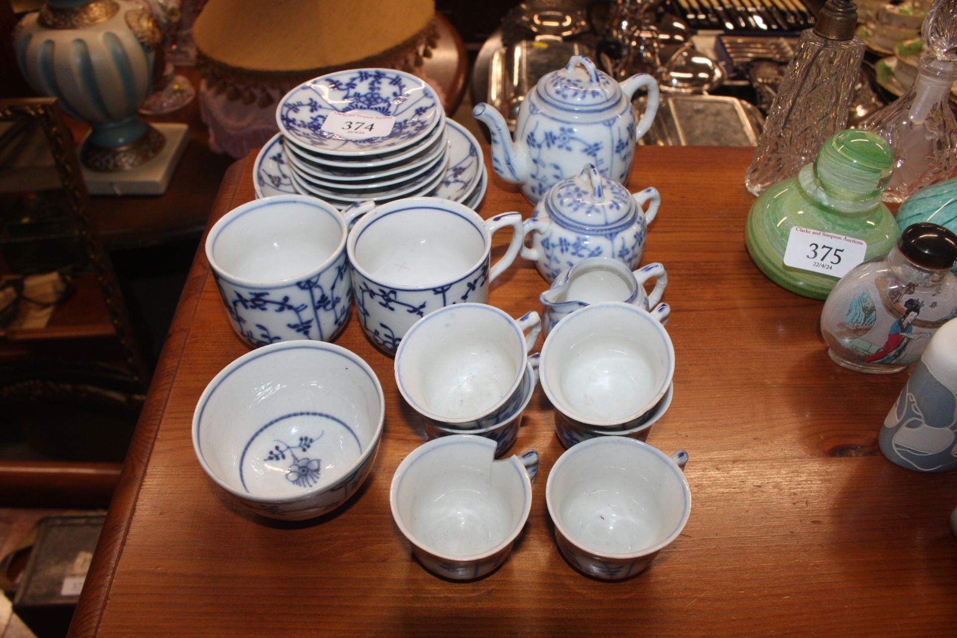 A collection of Dresden style dolls tea ware (some