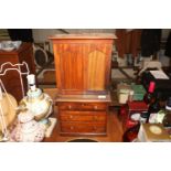 A mahogany apprentice piece linen press