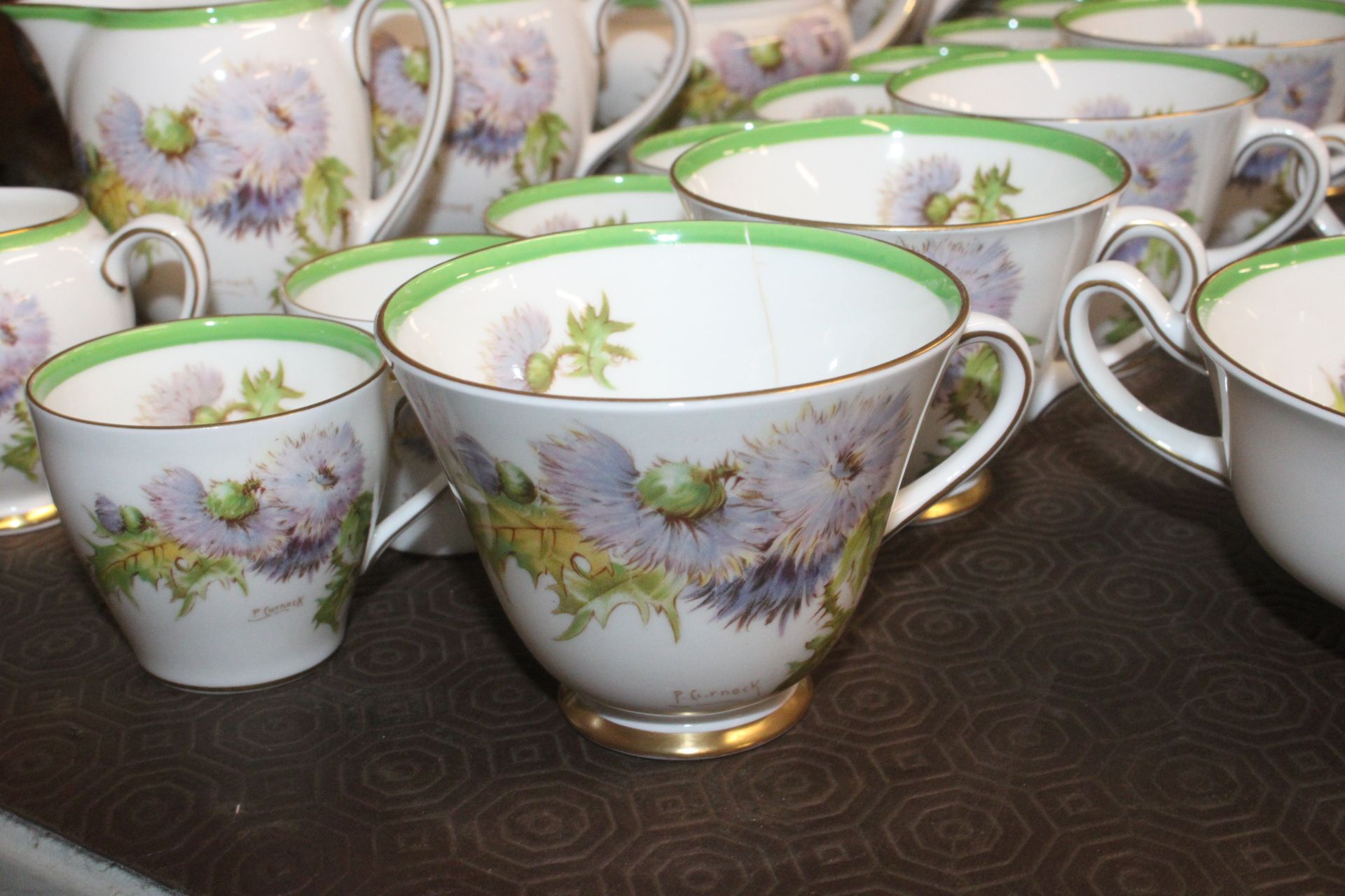 A Royal Doulton "Glamis Thistle" decorated tea / dinner service comprising dinner plates, side - Image 5 of 9