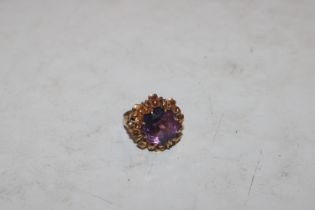 A French 18ct gold ring set with coloured stone, approx. 7gms total weight