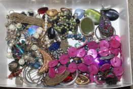A box of costume jewellery to include necklaces an