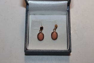 A pair of 9ct gold and coral drop ear-rings