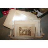 A box of various vintage photographs