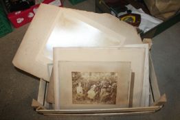 A box of various vintage photographs