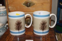 A pair of Wedgwood Mocha ware mugs